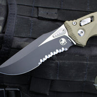 Microtech Knives- Amphibian Ram-Lok Folder- Fluted OD Green G-10 Handle- Black Part Serrated Edge Blade 137RL-2 FLGTOD
