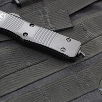 Microtech Troodon OTF Knife- Tactical- Single Edge- Black Handle- Black Part Serrated Blade 139-2 T 2020