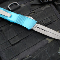 Microtech Combat Troodon OTF Knife- Double Edge- Weathered Turquoise Handle- Apocalyptic Blade 142-10 APWTQ