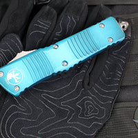 Microtech Combat Troodon OTF Knife- Double Edge- Weathered Turquoise Handle- Apocalyptic Blade 142-10 APWTQ