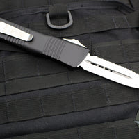 Microtech Combat Troodon OTF Knife- Double Edge- Black Handle- Full Serrated Stonewash Blade 142-12