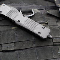 Microtech Combat Troodon OTF Knife- Double Edge- Carbon Fiber Top Handle- Black Full Serrated Edge Blade 142-3 CFS SN091