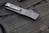 Microtech Combat Troodon OTF Knife- Double Edge- Carbon Fiber Top Handle- Black Full Serrated Edge Blade 142-3 CFS SN090