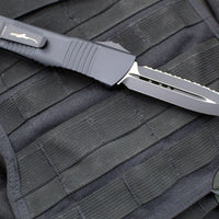 Microtech Combat Troodon OTF Knife- Double Edge- Carbon Fiber Top Handle- Black Full Serrated Edge Blade 142-3 CFS SN095