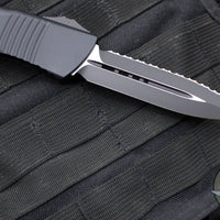 Microtech Combat Troodon OTF Knife- Double Edge- Carbon Fiber Top Handle- Black Full Serrated Edge Blade 142-3 CFS SN095