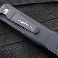 Microtech Combat Troodon OTF Knife- Double Edge- Carbon Fiber Top Handle- Black Full Serrated Edge Blade 142-3 CFS SN095