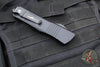 Microtech Combat Troodon OTF Knife- Double Edge- Carbon Fiber Top Handle- Black Full Serrated Edge Blade 142-3 CFS SN095