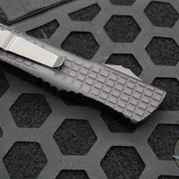Microtech Combat Troodon OTF Knife- Delta- Frag- Double Edge- Black Handle- Black DLC Full Serrated Blade- DLC HW Nickel Boron Internals 142-3CT-DSK