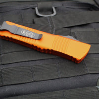 Microtech Combat Troodon OTF Knife- Single Edge-  Orange Handle- Black Part Serrated Blade 143-2 OR