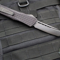 Microtech Combat Troodon OTF Knife- Delta -Shadow- Tanto Edge- Black Frag Handle-Black DLC Blade- HW Nickel Boron Internals 144-1CT-DSH