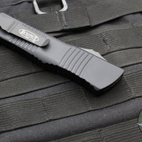 Microtech 2019 Combat Troodon OTF Knife- Tanto Edge- Black Handle- Black Part Serrated Blade 144-2 T