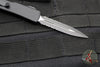 Microtech UTX-70 OTF Knife- Double Edge- Tactical- Black Handle- Black Part Serrated Edge Blade 147-2 T