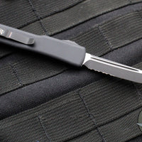 Microtech UTX-70 OTF Knife- Tactical- Tanto Edge- Black Handle- Black Part Serrated Blade 149-2 T V3