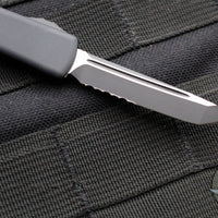 Microtech UTX-70 OTF Knife- Tactical- Tanto Edge- Black Handle- Black Part Serrated Blade 149-2 T V3