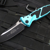 Microtech Socom Elite- Manual Folder- Single Edge- Turquoise Handle- Two-tone Black Blade 160-1 TQ