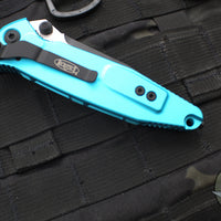 Microtech Socom Elite- Manual Folder- Single Edge- Turquoise Handle- Two-tone Black Blade 160-1 TQ