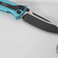 Microtech Socom Elite- Manual Folder- Single Edge- Turquoise Handle- Two-tone Black Blade 160-1 TQ