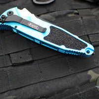 Microtech Socom Elite- Auto-  Tanto Edge- Turquoise Handle- Black Full Serrated Blade 161A-3 TQ