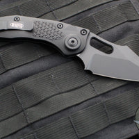 Microtech Stitch OTS Auto Knife- Black Handle- Black Blade- Blue Titanium Backspacer 169-1BK-A1TI