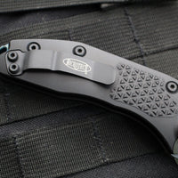 Microtech Stitch OTS Auto Knife- Black Handle- Black Blade- Antique Green Titanium Backspacer 169-1BK-A3TI