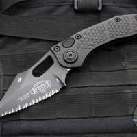 Microtech Stitch OTS Auto Knife- Black Handle- Black Full Serrated Blade- Blue Titanium Backspacer 169-3BK-A1TI