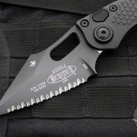 Microtech Stitch OTS Auto Knife- Black Handle- Black Full Serrated Blade- Blue Titanium Backspacer 169-3BK-A1TI