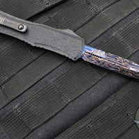 Microtech Hera II OTF Knife- MINI-  Bayonet Edge- Black Deep Logo Burst Handle- Blued Vegas Forge Damascus Blade 1701M-16 MS2 v2