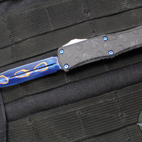 Microtech Hera II OTF Knife- MINI- Double Edge- Black Deep Logo Burst Handle- Blued Baker Forge Coppermai Damascus Blade- Blue HW 1702M-16 MS3