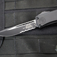 Microtech Hera II OTF Knife- MINI- Single Edge- Tactical- Black Handle- Black Part Serrated Blade 1703M-2 T