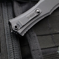 Microtech Hera II OTF Knife- MINI- Single Edge- Tactical- Black Handle- Black Part Serrated Blade 1703M-2 T