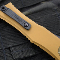 Microtech Hera II OTF Knife- MINI- Recurve Edge- Tan Handle- Black Blade 1705M-1 TA