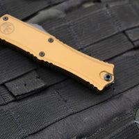 Microtech Hera II OTF Knife- MINI- Recurve Edge- Tan Handle- Black Blade 1705M-1 TA