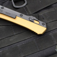 Microtech Glykon OTF Knife- Tanto Edge- Tan Handle With Black Finished Titanium Accents and Hardware- Black Finished Full Serrated Blade 185-3 TA