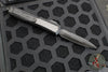 Microtech Makora OTF Knife- Double Edge- Shadow- Black Handle- Carbon Fiber Inlay- Black DLC Full Serrated Blade- Black DLC HW 206-3 DLCTCFISH