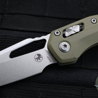 Microtech Knives- M.S.I. Ram-Lok Folder- "Lawnman" Series- Frag OD Green G-10 Handle- Stonewash Plain Edge Blade 210-10 FRGTODLM