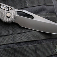 Microtech Knives- M.S.I. Ram-Lok Folder- Fluted Carbon Fiber Handle- Black DLC Finished Plain Edge Blade 210-1 DLCTFLCFS