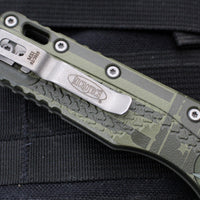 Microtech Knives- M.S.I. Ram-Lok Folder- OD Green Tri-Grip Injection Molded Handle- Flag Graphic- Apocalyptic Plain Edge Blade 210T-10 APPMODFLAG