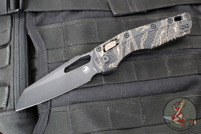 Microtech Knives- M.S.I. Ram-Lok Folder- Tiger Stripe Camo Finished Tri-Grip Injection Molded Handle- Black Apocalyptic Plain Edge Blade- Bronzed Apocalyptic HW 210T-1 APPMTSC-V4W2