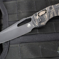 Microtech Knives- M.S.I. Ram-Lok Folder- Tiger Stripe Camo Finished Tri-Grip Injection Molded Handle- Black Apocalyptic Plain Edge Blade- Bronzed Apocalyptic HW 210T-1 APPMTSC-V4W2