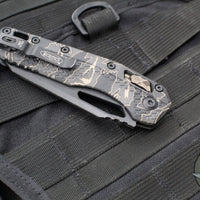 Microtech Knives- M.S.I. Ram-Lok Folder- Tiger Stripe Camo Finished Tri-Grip Injection Molded Handle- Black Apocalyptic Plain Edge Blade- Bronzed Apocalyptic HW 210T-1 APPMTSC-V4W2
