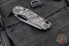 Microtech Knives- M.S.I. Ram-Lok Folder- Tiger Stripe Camo Finished Tri-Grip Injection Molded Handle- Black Apocalyptic Plain Edge Blade- Bronzed Apocalyptic HW 210T-1 APPMTSC-V4W2