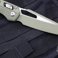 Microtech Knives- M.S.I. Ram-Lok Folder- Vintage Green Tri-Grip Injection Molded Handle- Cerakoted Vintage Green Plain Edge Blade- Apocalyptic Hardware 210T-1 PMCVG