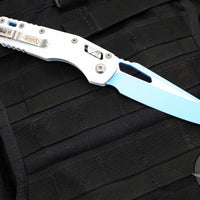 Microtech Knives- M.S.I. Ram-Lok Folder- White Tri-Grip Injection Molded Handle- Sky Blue Plain Edge Blade 210T-1 PMCWH-Y7