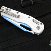 Microtech Knives- M.S.I. Ram-Lok Folder- White Tri-Grip Injection Molded Handle- Sky Blue Plain Edge Blade 210T-1 PMCWH-Y7