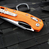 Microtech Knives- M.S.I. Ram-Lok Folder- Orange Tri-Grip Injection Molded Handle- Black Plain Edge Blade- Bead Blast Hardware 210T-1 PMOR