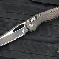 Microtech Knives- M.S.I. Ram-Lok Folder- Outbreak Green Finished Tri-Grip Injection Molded Handle- Black Full Serrated Edge Blade- 210T-3 PMOBS