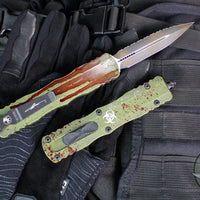 Microtech Dirac Delta OTF Knife- Double Edge- Outbreak Finished Handle- Outbreak Distressed Black Full Serrated Edge Blade 227-3 OBDS