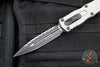 Microtech Dirac Delta OTF Knife- Double Edge- Titanium Gray Handle- Black Full Serrated Blade and Black HW 227-3 TG