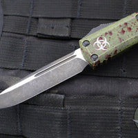 Microtech UTX-85 OTF Knife- Single Edge- Outbreak Finished Handle- Outbreak Black Plain Edge Blade 231-1 OBDS