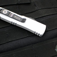 Microtech UTX-85 OTF Knife- Single Edge- Stormtrooper- White Distressed Finished Handle- Deep Etched Logo- White Blade 231-1 STD